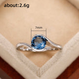 Fashion Twisted Arm Blue Round Diamond Zircon Topaz Simple Women's Ring