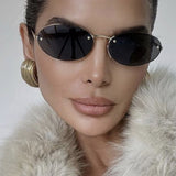 Fashion Personality Metal Frameless Oval Rivet Sun Glasses