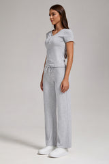 Women's Casual Sports Two-piece Set With V-neck Button, Short Sleeved, Low Waisted Flared Pants, Sportswear