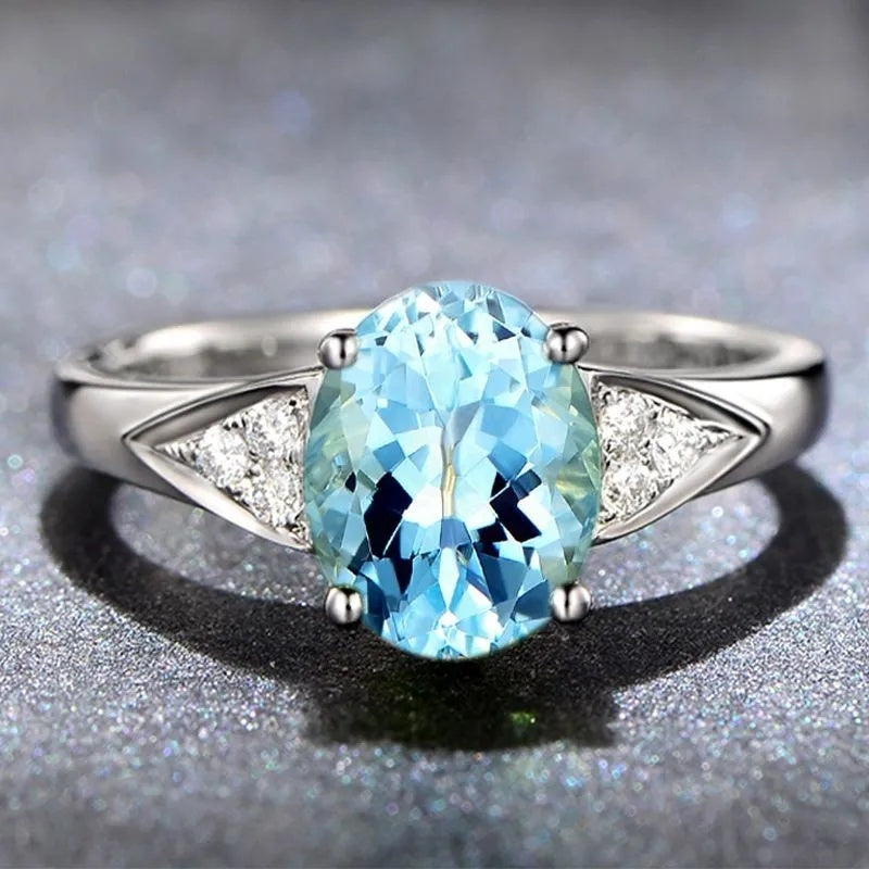 A Niche Design With A Red And Blue Zircon Ring Inlaid