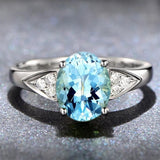 A Niche Design With A Red And Blue Zircon Ring Inlaid