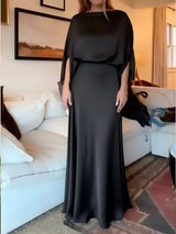 A Sleek Solid-color Satin Dress With Smooth Lines