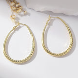 Golden Glossy Spring Fastener Egg-shaped Earrings Hypoallergenic Copper