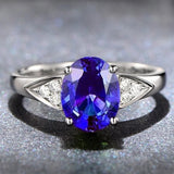 A Niche Design With A Red And Blue Zircon Ring Inlaid