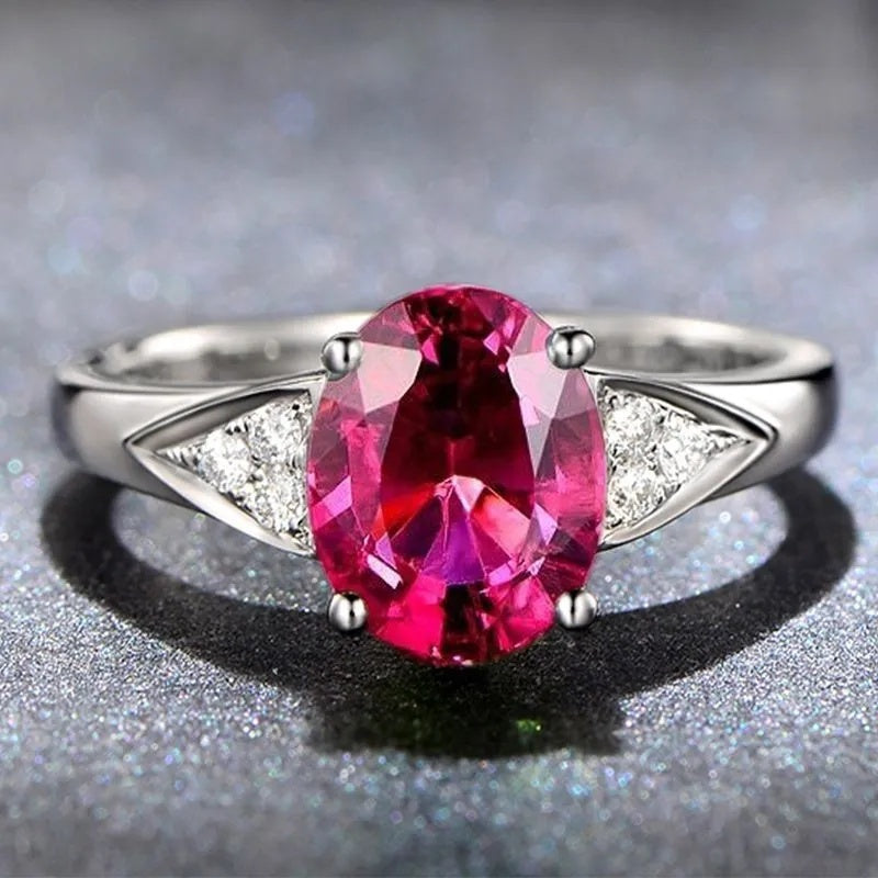 A Niche Design With A Red And Blue Zircon Ring Inlaid